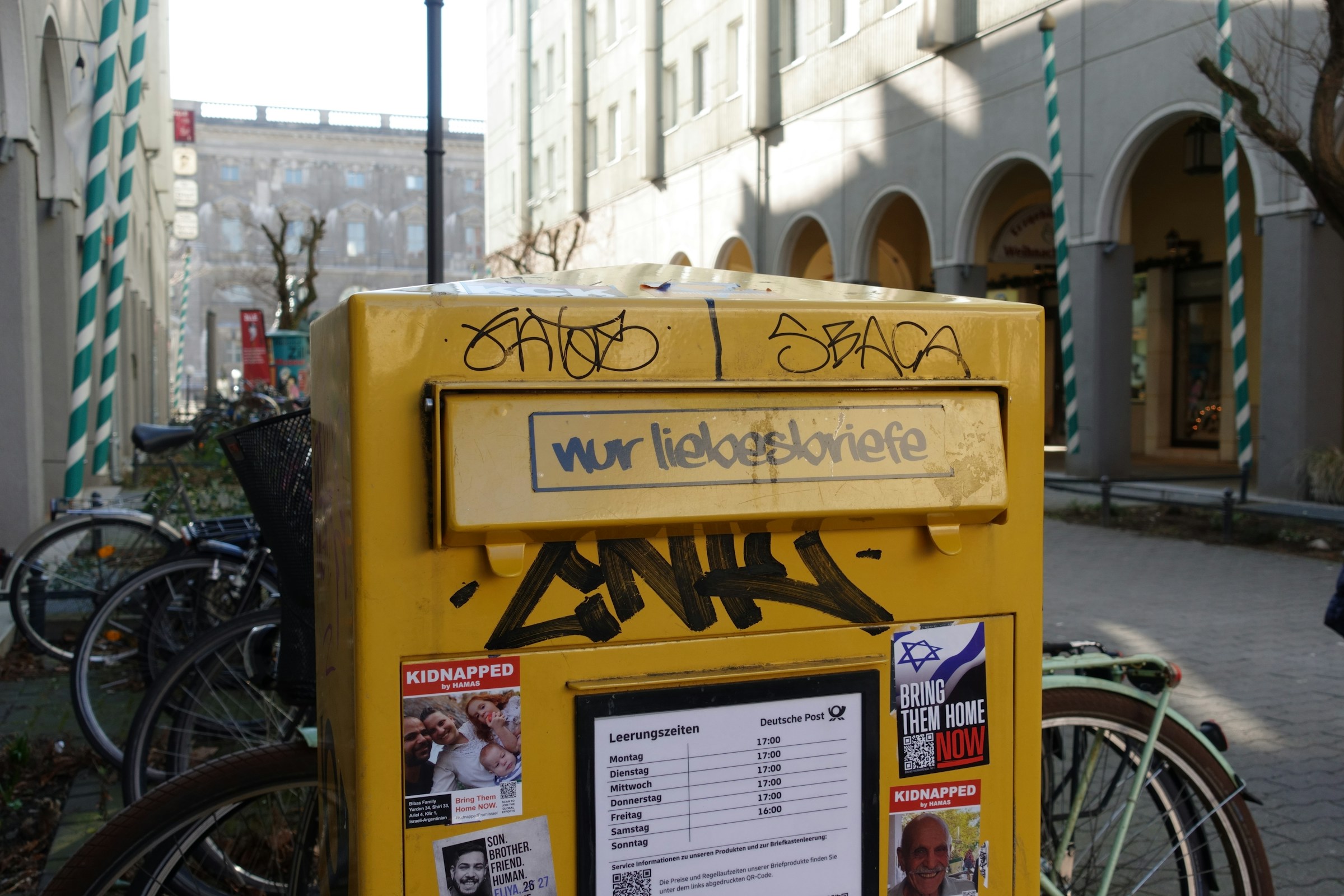 a german mailbox without graffiti reading 'love letters only'