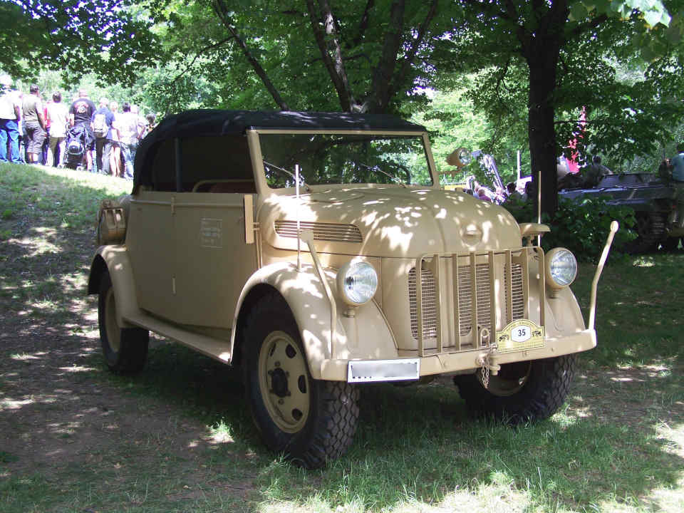 sand-coloured convertible with black top